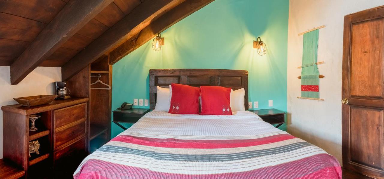 Yox Hotel Boutique San Cristóbal de Las Casas 외부 사진 A bedroom at the hotel