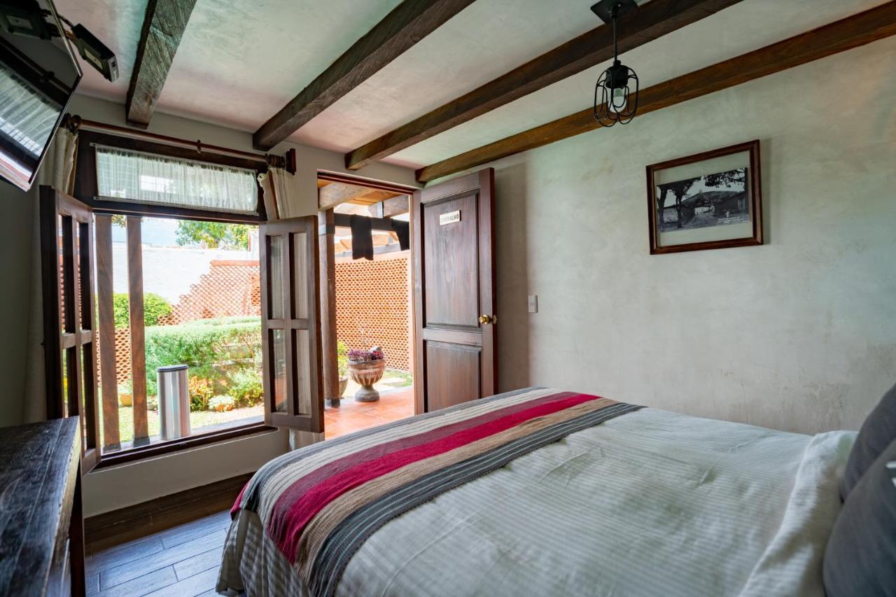 Yox Hotel Boutique San Cristóbal de Las Casas 외부 사진 A bedroom at the hotel